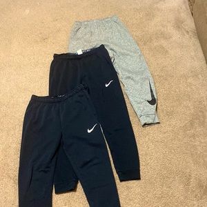 Bundle of 3 Nike Dri-fit pants. All 3 are size medium and in good shape.